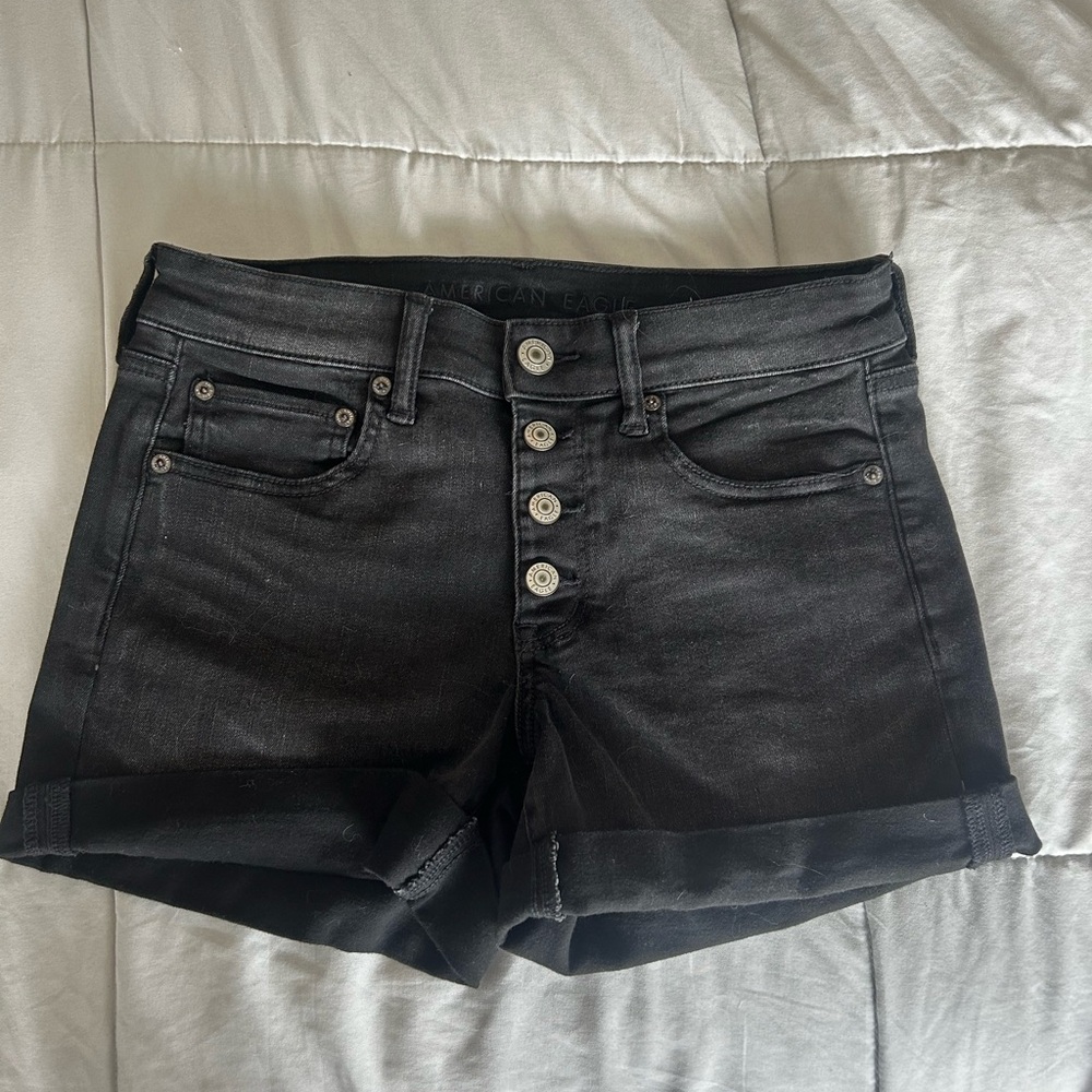 American eagle “next level stretch” size 6 multi button up jean shorts black